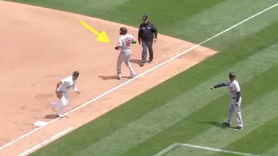 Trey Mancini tagged out at first