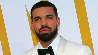 Drake in a suit