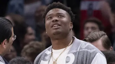 Dwayne Haskins looking on