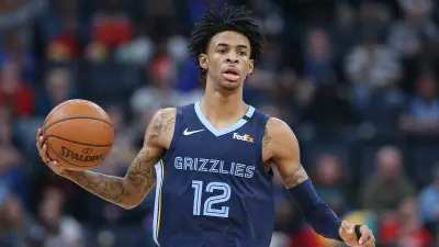 Ja Morant dribbles the ball