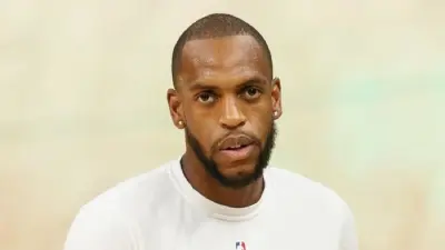Khris Middleton looking on