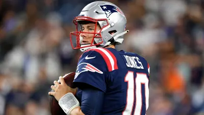 Mac Jones in pads