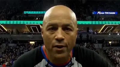 Referee Marc Davis speaking