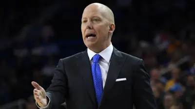 Mick Cronin in a suit
