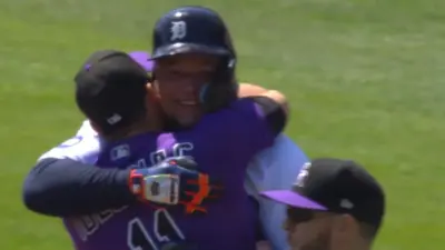 Jose Iglesias hugs Miguel Cabrera