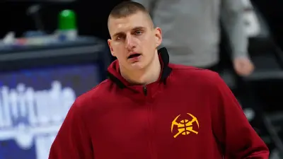 Nikola Jokic in a nuggets sweater