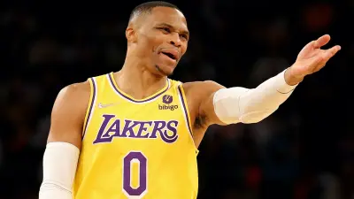 Russell Westbrook with his arm out