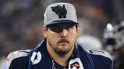 Taylor Lewan with a towel