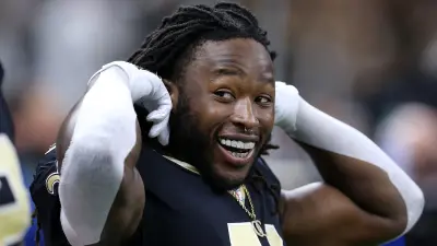 Alvin Kamara smiling in his New Orleans Saints uniform