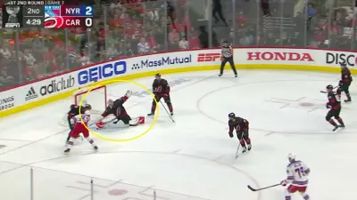 Antti Raanta stretches for a puck