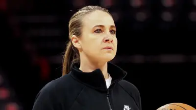 Becky Hammon looking on