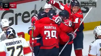Caps celebrate after a goal