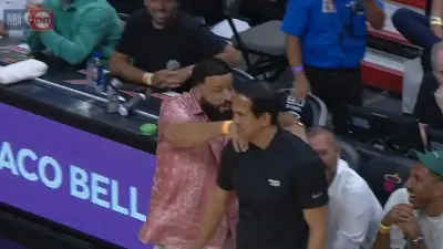 DJ Khaled massages Erik Spoelstra