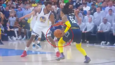 Ja Morant carries the ball