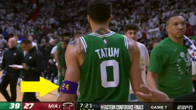 Jayson Tatum wears an armband