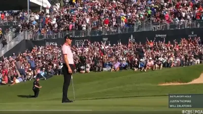 Justin Thomas poses