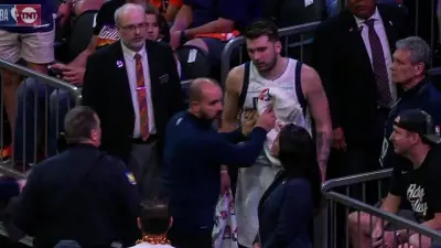 Luka Doncic gets restrained