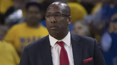 Mike Brown in a suit and tie