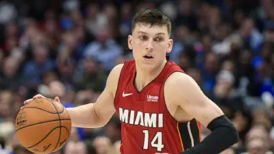 Tyler Herro dribbling while in a Heat uniform
