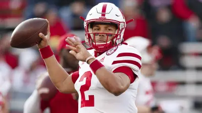 Adrian Martinez throws a pass