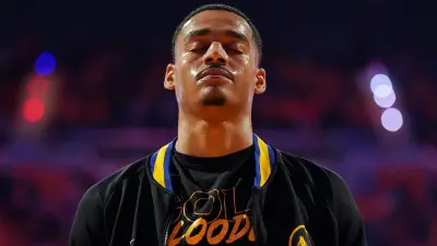 Jordan Poole with his eyes closed in Warriors warmups