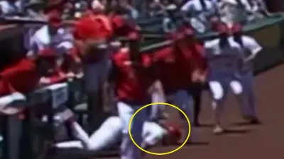 Archie Bradley falling out of the dugout