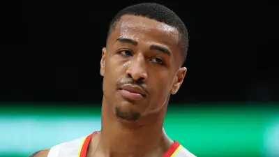 John Collins looks on