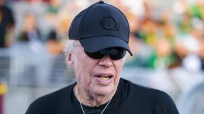 Phil Knight in an Oregon hat