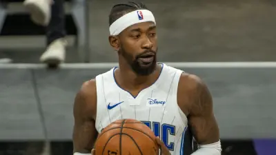 Terrence Ross holding a basketball