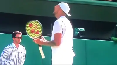 Nick Kyrgios shouts at his box