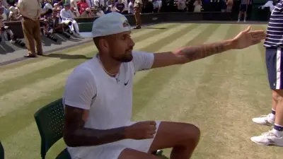 Nick Kyrgios complains to the chair umpire