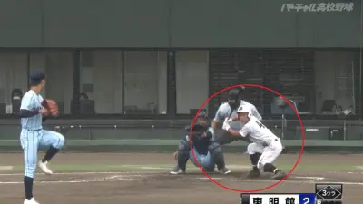 Batter crouches low