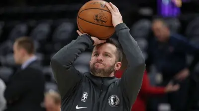 JJ Barea shooting a basketball