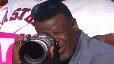 Ken Griffey Jr. holding a camera