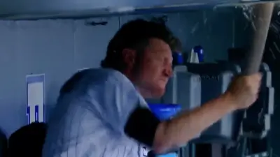 Kyle Freeland slamming a bat into the dugout roof