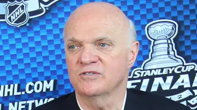 Lou Lamoriello looking away.