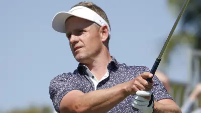 Luke Donald finishing a shot