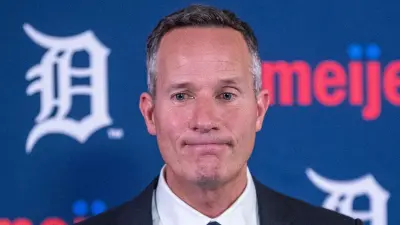 Chris Ilitch looking away.