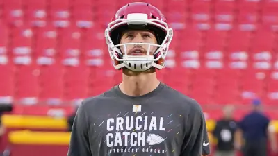 Harrison Butker looking up.