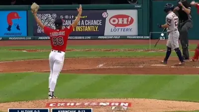 James Karinchak raises his arms