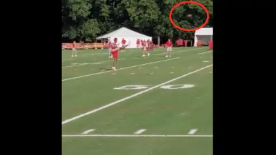 Justin Reid kicking a 65-yard field goal in practice.