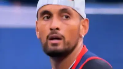 Nick Kyrgios glares