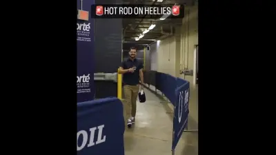 Rodrigo Blankenship arriving to a preseason game wearing Heelys.
