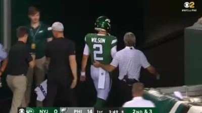 Zach Wilson walking to the locker room