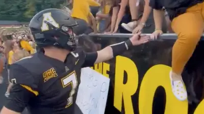 Appalachian State fans celebrate a Hail Mary win