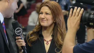 Rachel Nichols holding a microphone