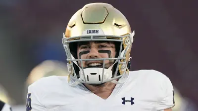 Drew Pyne in a helmet