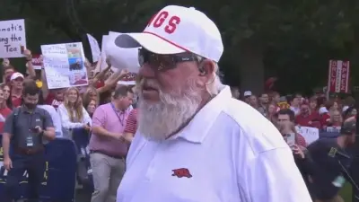 John Daly in an Arkansas hat