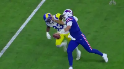 Josh Allen gives a stiffarm