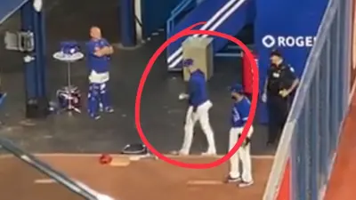Matt Buschmann holds a ball